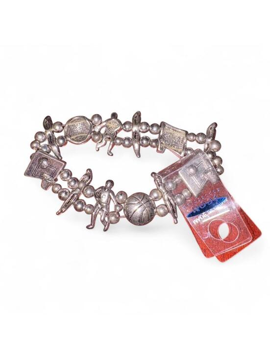 Jewelry - This vintage silver-toned charm bracelet features basketball-themed pendants
